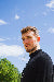 files/sideways-portrait-man-looking-camera_1.webp